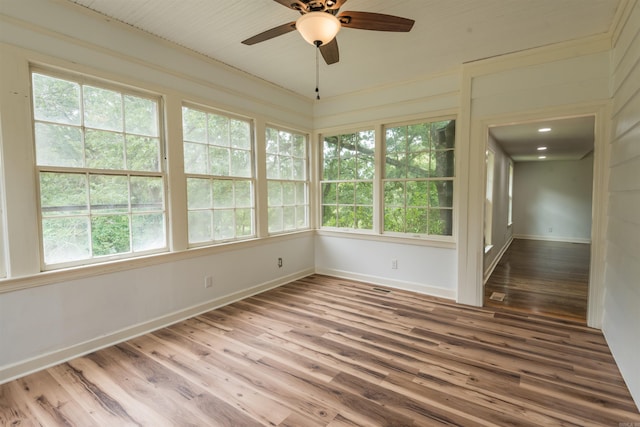 919 River Rdg, Benton, AR 72019 - unfurnished sunroom featuring plenty of natural light, wood finished floors, and baseboards