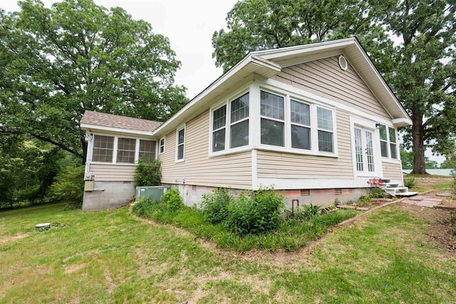 919 River Rdg, Benton, AR 72019 - view of side of home with crawl space, a yard, entry steps, and central air condition unit