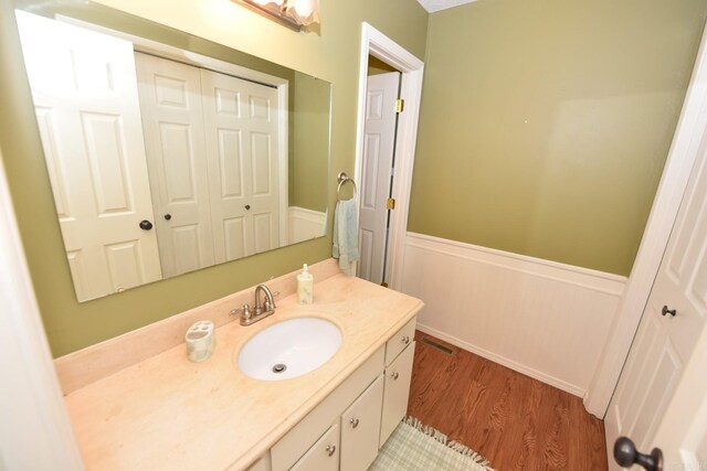135 Hillview Dr Unit 82, Fairfield Bay, AR 72088 - bathroom featuring vanity and wood finished floors