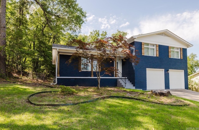 41 Brookridge Dr, Little Rock, AR 72205 - view of front of house featuring a garage, brick siding, a front lawn, and concrete driveway