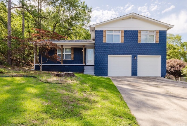 41 Brookridge Dr, Little Rock, AR 72205 - split level home featuring a garage, driveway, a front lawn, and brick siding