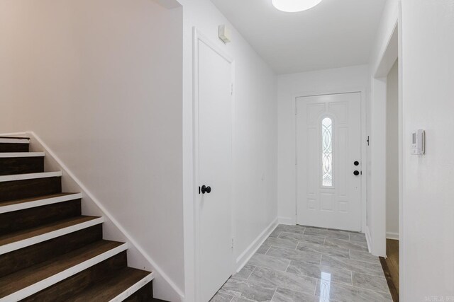 41 Brookridge Dr, Little Rock, AR 72205 - entryway with stairway and baseboards