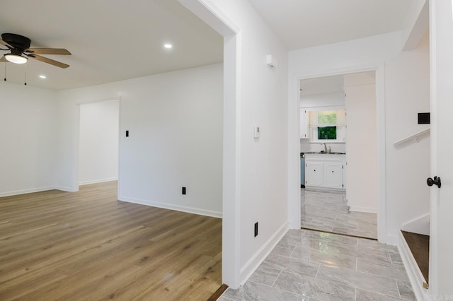41 Brookridge Dr, Little Rock, AR 72205 - corridor with a sink, recessed lighting, baseboards, and light wood-type flooring