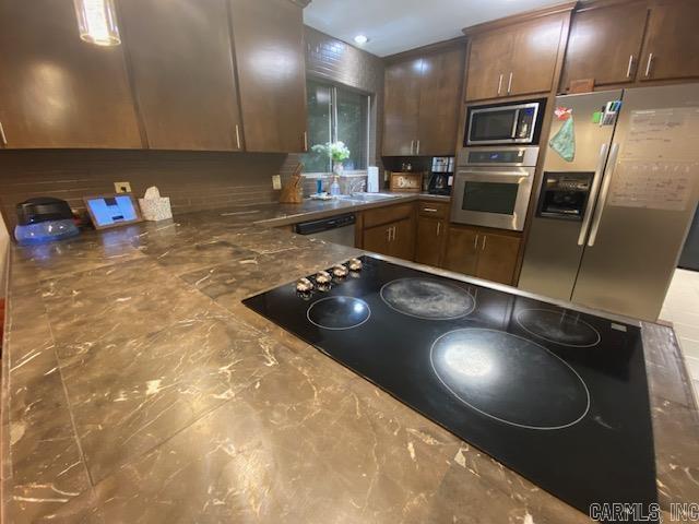 8 Westbrook Cv, Little Rock, AR 72205 - kitchen featuring appliances with stainless steel finishes and a sink