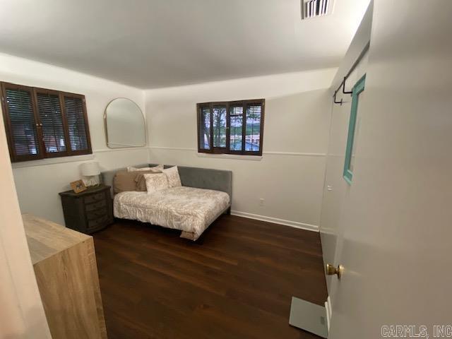 8 Westbrook Cv, Little Rock, AR 72205 - bedroom featuring wood finished floors