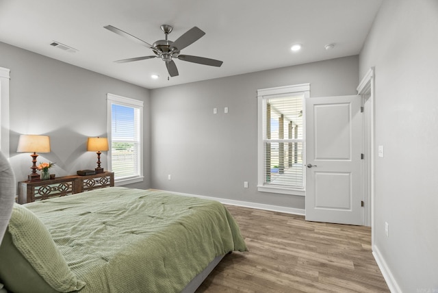 170 Irene Cir, Greenbrier, AR 72058 - bedroom featuring wood finished floors, baseboards, recessed lighting, and ceiling fan
