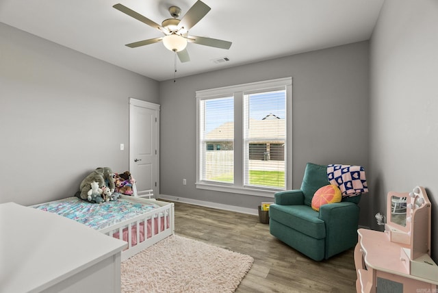 170 Irene Cir, Greenbrier, AR 72058 - bedroom featuring wood finished floors, baseboards, and a ceiling fan
