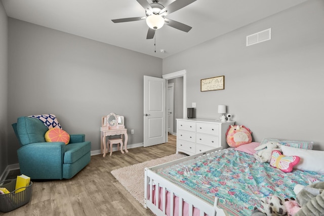 170 Irene Cir, Greenbrier, AR 72058 - bedroom with light wood finished floors, baseboards, and a ceiling fan