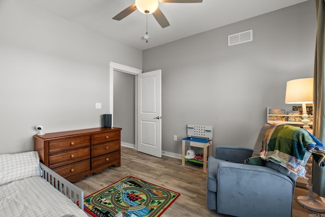170 Irene Cir, Greenbrier, AR 72058 - bedroom with wood finished floors, baseboards, and a ceiling fan