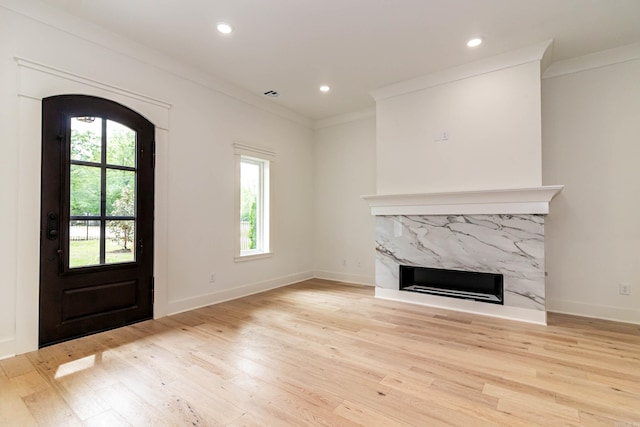 1615 N Garland Ave, Fayetteville, AR 72703 - foyer with crown molding, a fireplace, light wood-style floors, baseboards, and recessed lighting