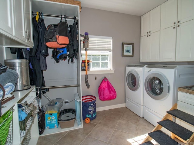 1 Witness Tree Ln, Paron, AR 72122 - washroom featuring washer and clothes dryer, cabinet space, light tile patterned floors, and baseboards