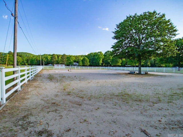 1 Witness Tree Ln, Paron, AR 72122 - view of yard featuring an outdoor riding arena and a forest view