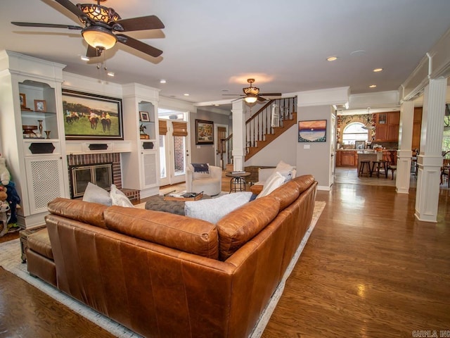 1 Witness Tree Ln, Paron, AR 72122 - living room with a ceiling fan, ornamental molding, stairway, dark wood-style floors, and recessed lighting
