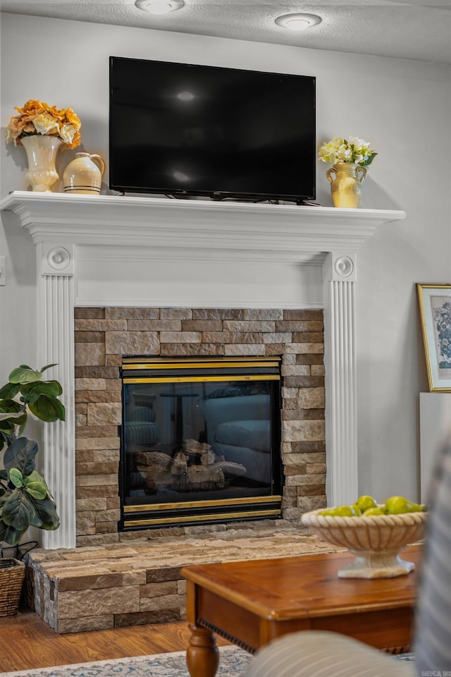 1050 Santa Fe Trl, Conway, AR 72034 - detailed view of a stone fireplace and wood finished floors