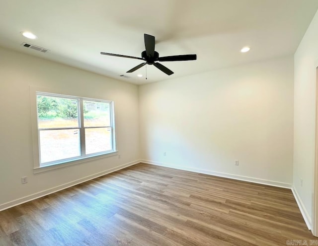 81 Lewis Loop, Greenbrier, AR 72058 - spare room featuring wood finished floors, baseboards, a ceiling fan, and recessed lighting
