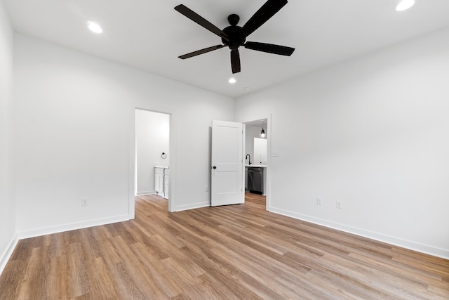 81 Lewis Loop, Greenbrier, AR 72058 - unfurnished bedroom featuring light wood-type flooring, baseboards, recessed lighting, ensuite bath, and a ceiling fan