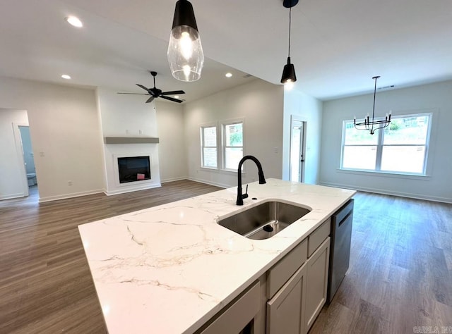 81 Lewis Loop, Greenbrier, AR 72058 - kitchen with a sink, stainless steel dishwasher, baseboards, open floor plan, and recessed lighting