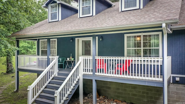 100 Hidgen Rdg, Higden, AR 72067 - view of front facade featuring roof with shingles, a porch, and stairs
