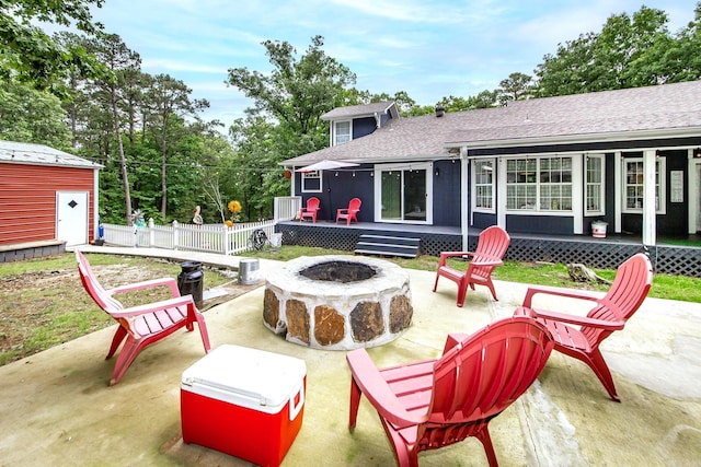 100 Hidgen Rdg, Higden, AR 72067 - view of patio / terrace with an outdoor fire pit