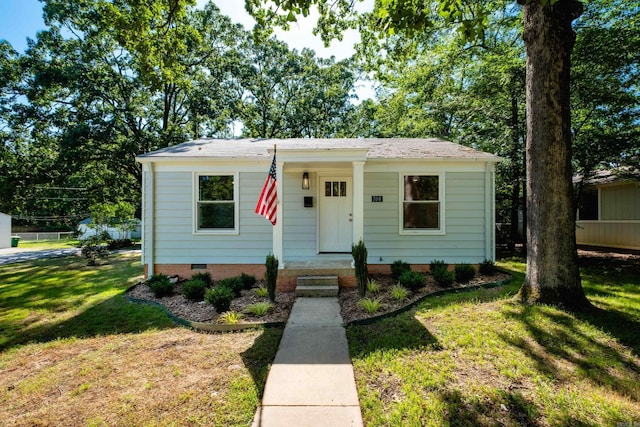 700 N Taylor St, Little Rock, AR 72205 - bungalow featuring a front yard and crawl space