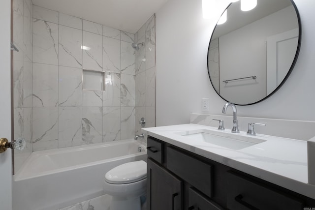 700 N Taylor St, Little Rock, AR 72205 - bathroom featuring vanity, toilet, bathtub / shower combination, and marble look tiles