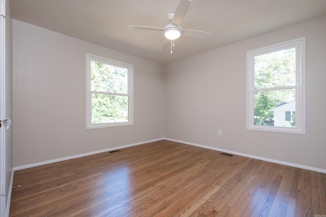 700 N Taylor St, Little Rock, AR 72205 - empty room with light wood finished floors, baseboards, and a ceiling fan