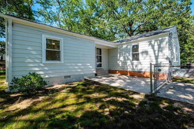 700 N Taylor St, Little Rock, AR 72205 - rear view of house with crawl space, entry steps, a patio area, and a gate