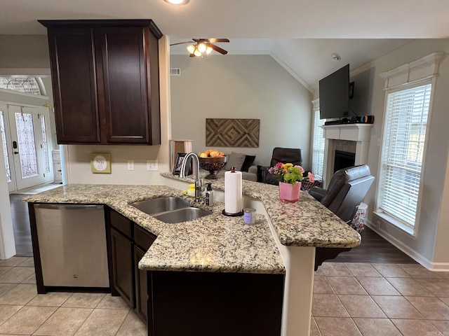 1056 Skyline Dr, Alexander, AR 72002 - kitchen with a sink, dishwasher, open floor plan, a ceiling fan, and light tile patterned flooring