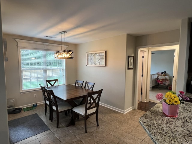 1056 Skyline Dr, Alexander, AR 72002 - tiled dining area featuring baseboards