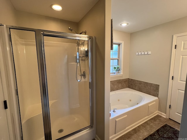 1056 Skyline Dr, Alexander, AR 72002 - full bath featuring a shower stall, a tub with jets, and tile patterned flooring