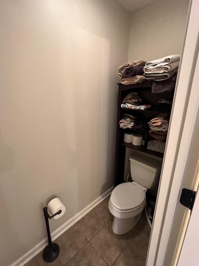 1056 Skyline Dr, Alexander, AR 72002 - bathroom with tile patterned floors, toilet, and baseboards
