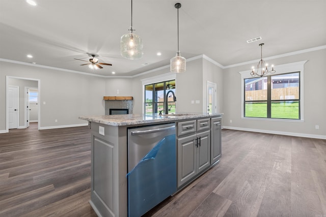 10114 Hidden Cir, Sherwood, AR 72120 - kitchen with dishwasher, baseboards, dark wood-style floors, a fireplace, and open floor plan