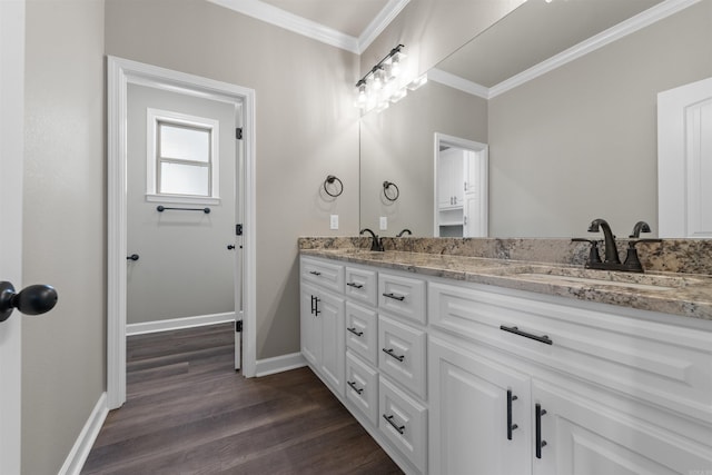 10114 Hidden Cir, Sherwood, AR 72120 - full bathroom with crown molding, double vanity, wood finished floors, and baseboards