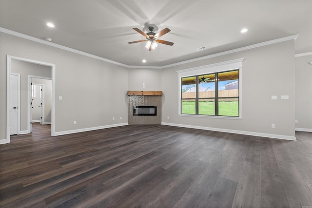 10114 Hidden Cir, Sherwood, AR 72120 - unfurnished living room with ornamental molding, a ceiling fan, dark wood finished floors, a glass covered fireplace, and baseboards
