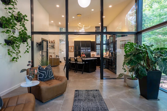 10119 Garrison Rd, Little Rock, AR 72223 - lobby with a towering ceiling, recessed lighting, and expansive windows