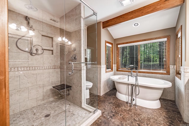 21 Constantina Cir, Hot Springs Village, AR 71909 - full bathroom with tile walls, a stall shower, a freestanding bath, toilet, and wainscoting