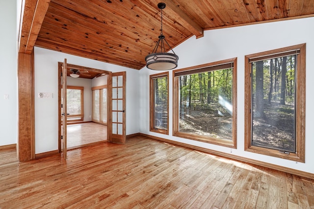 21 Constantina Cir, Hot Springs Village, AR 71909 - unfurnished dining area with light wood-type flooring, wooden ceiling, french doors, and baseboards