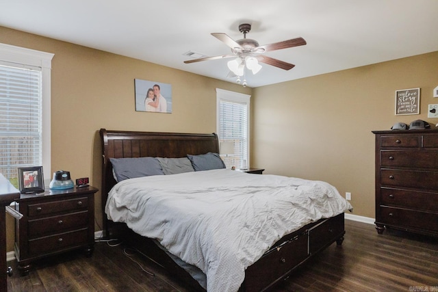 3961 Mountaincrest Cir, Alexander, AR 72002 - bedroom featuring dark wood finished floors, a ceiling fan, and baseboards