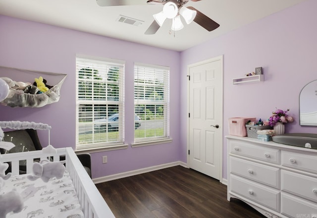 3961 Mountaincrest Cir, Alexander, AR 72002 - bedroom with dark wood-type flooring, baseboards, and a ceiling fan