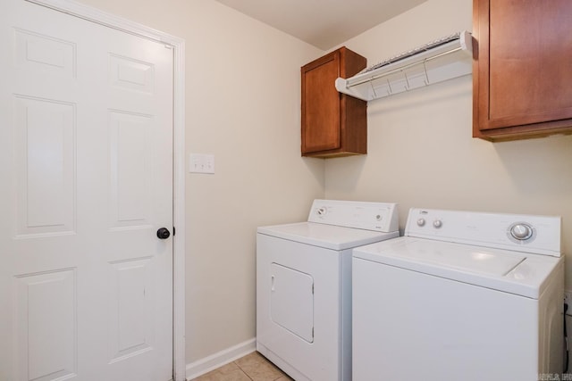 3961 Mountaincrest Cir, Alexander, AR 72002 - washroom featuring cabinet space, washing machine and clothes dryer, baseboards, and light tile patterned flooring