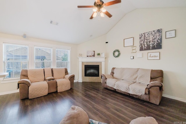 3961 Mountaincrest Cir, Alexander, AR 72002 - living room with lofted ceiling, ceiling fan, dark wood-type flooring, a tile fireplace, and baseboards