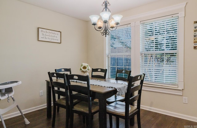 3961 Mountaincrest Cir, Alexander, AR 72002 - dining area with a chandelier, dark wood finished floors, and baseboards