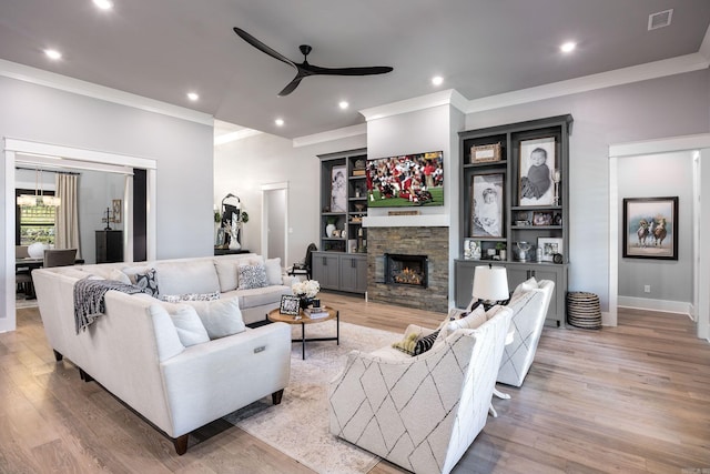 11 Haywood Ct, Little Rock, AR 72223 - living area with ornamental molding, a ceiling fan, light wood-type flooring, recessed lighting, and a fireplace