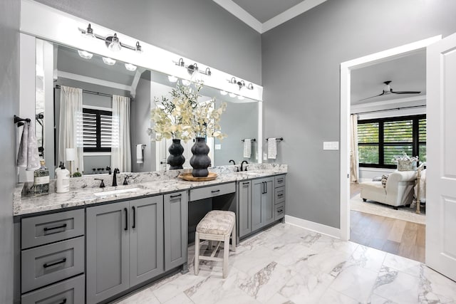 11 Haywood Ct, Little Rock, AR 72223 - bathroom featuring double vanity, baseboards, a ceiling fan, marble finish floors, and ornamental molding
