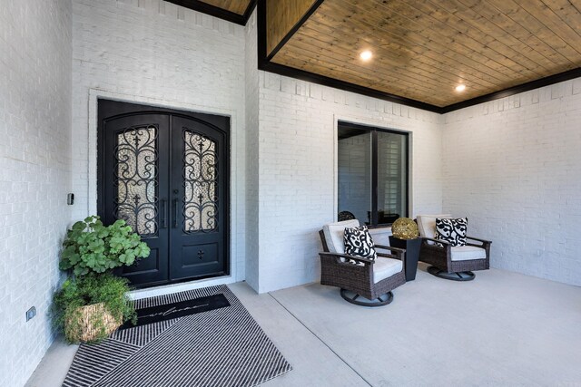 11 Haywood Ct, Little Rock, AR 72223 - view of exterior entry featuring french doors and brick siding