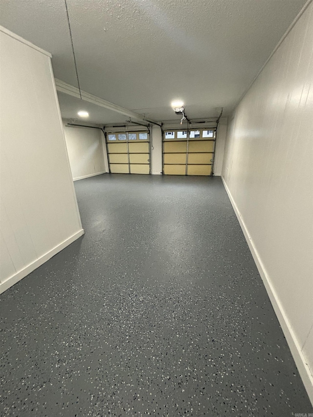 garage with baseboards