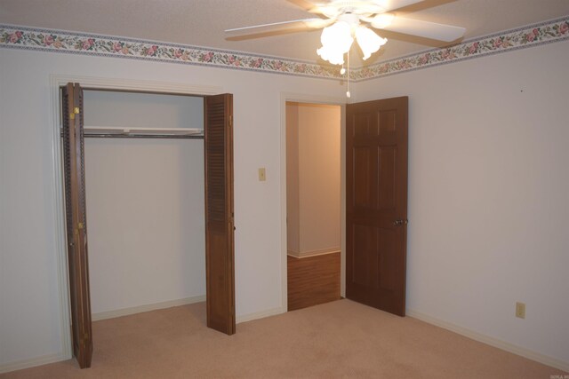 206 Beaconsfield Rd, Sherwood, AR 72120 - unfurnished bedroom featuring a closet, carpet flooring, and ceiling fan