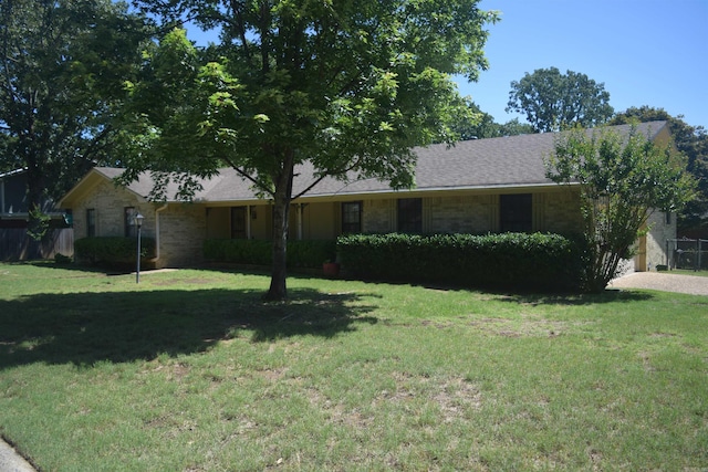 206 Beaconsfield Rd, Sherwood, AR 72120 - single story home with a front yard, brick siding, and roof with shingles