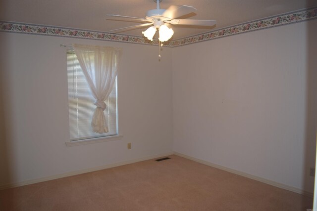 206 Beaconsfield Rd, Sherwood, AR 72120 - spare room featuring ceiling fan and light colored carpet