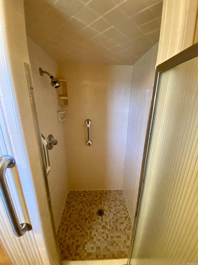 206 Beaconsfield Rd, Sherwood, AR 72120 - bathroom with a shower stall and tile patterned floors